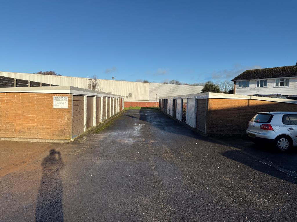 Lot: 25 - LAND WITH NINE GARAGES IN A LARGER BLOCK - General view of garages